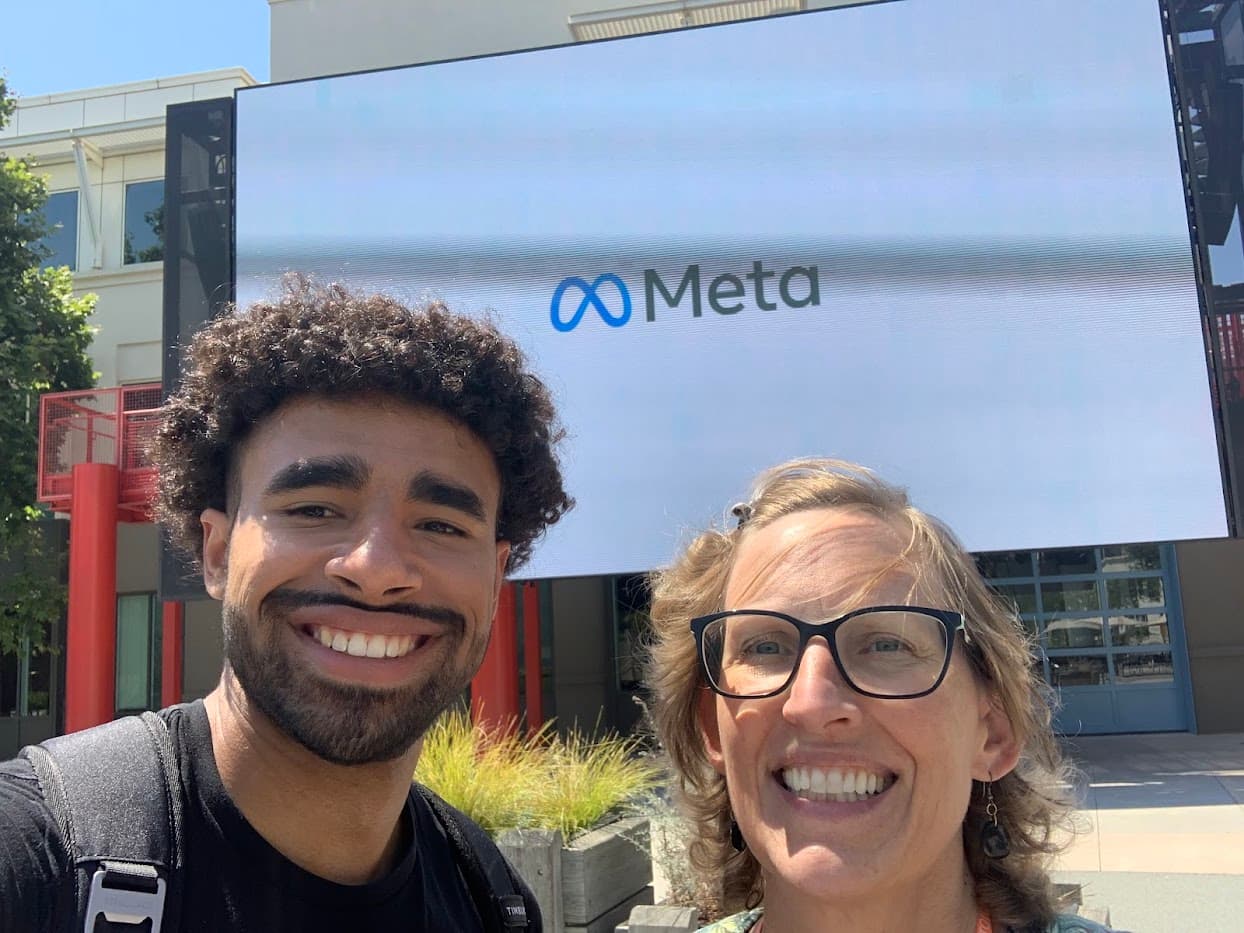 Julius at Meta showing his mom around